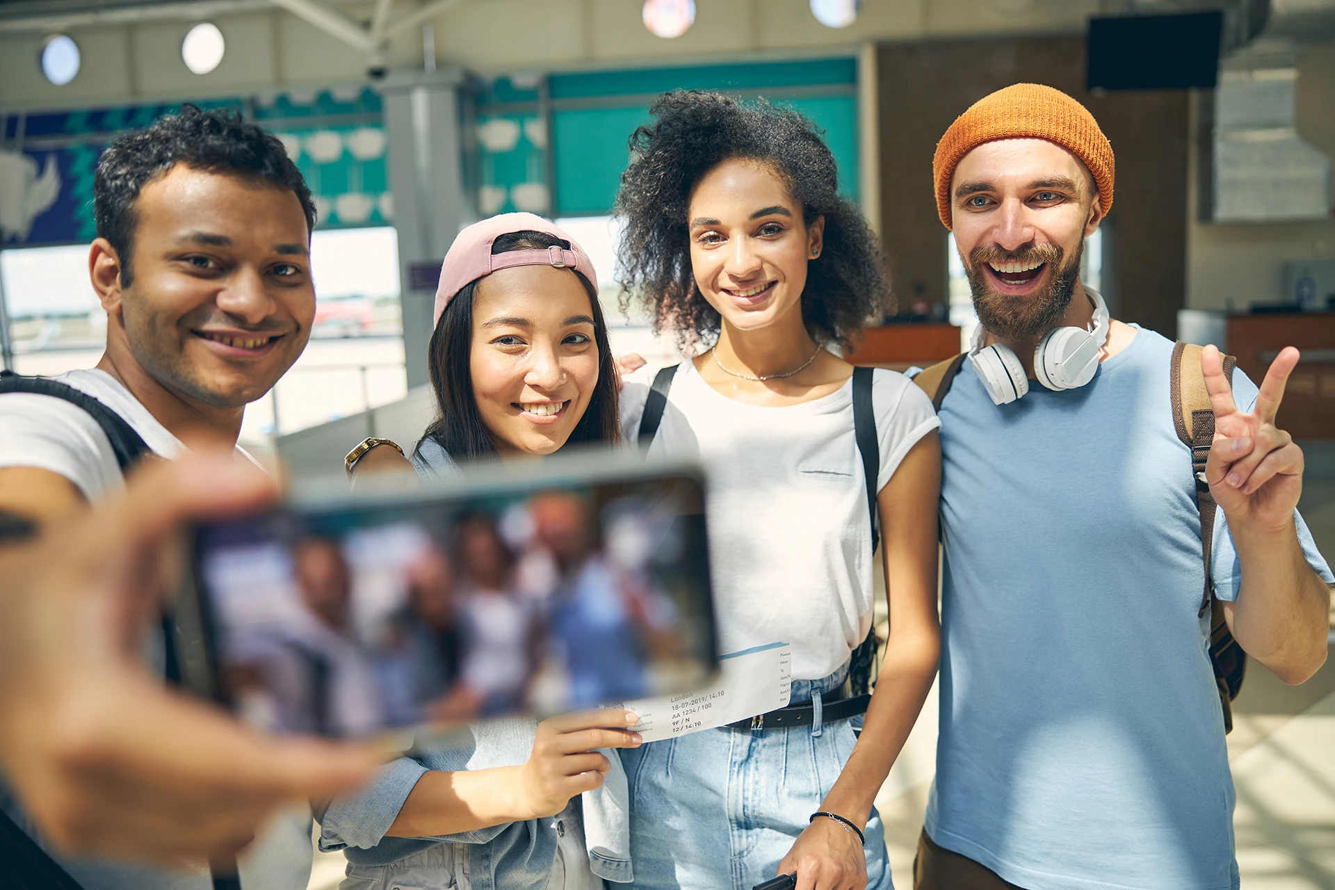 Young students taking selfies